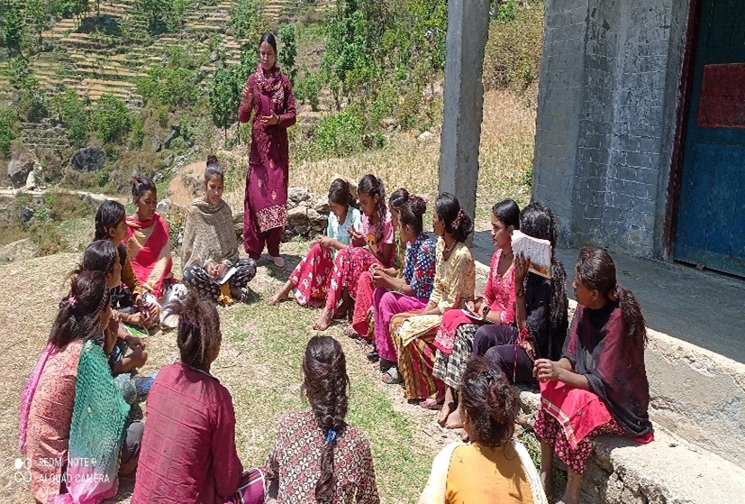 NWDF Rural Municipality vice-chairperson Mrs. Bisu Devi Nath is suggesting to adolescent girls on child marriage and social evils at ward no.03 adolescent group.